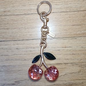 Coach glitter cherry charm